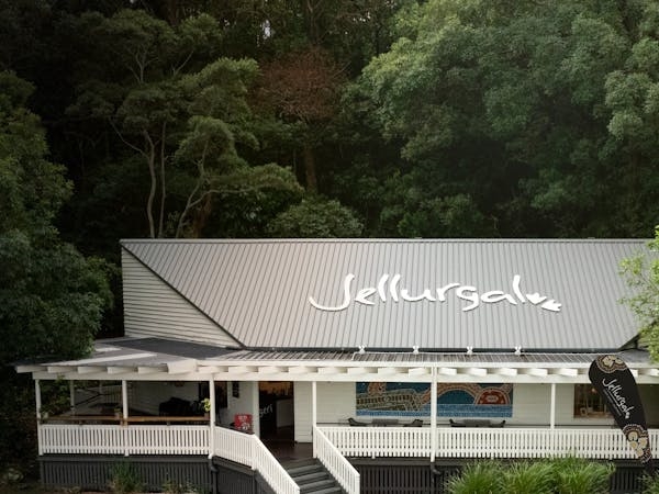 Jellurgal cultural centre surrounded by lush greenery, a popular stop for gold coast getaways.